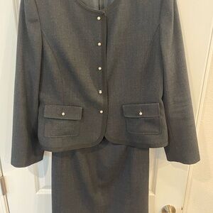 Grey 2 pc Suit with ribbon trim and pearl buttons size 18.
